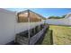 Raised garden bed featuring a covered area for delicate plants to thrive and grow well in the yard at 4810 County Road 114, Wildwood, FL 34785