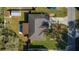 Overhead shot of home with a fenced in backyard and storage shed at 5900 Nw 61St Ct, Ocala, FL 34482