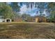 Spacious backyard with storage shed, patio and privacy fence at 5900 Nw 61St Ct, Ocala, FL 34482