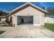 Spacious two-car garage with ample storage space and easy access to the home's interior at 5900 Nw 61St Ct, Ocala, FL 34482