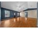 Bright living room features hardwood floors, high ceilings, and abundant natural light at 5900 Nw 61St Ct, Ocala, FL 34482