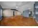Open concept living room with hardwood floors and high ceilings is perfect for entertaining at 5900 Nw 61St Ct, Ocala, FL 34482