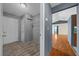 Mud room with tile flooring, storage, and entrance to living area at 5900 Nw 61St Ct, Ocala, FL 34482