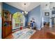 Dining room with a large window and wood floors at 6150 Nw 59Th Ave, Ocala, FL 34482