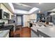 Well-lit kitchen with stainless appliances and ample counter space at 6150 Nw 59Th Ave, Ocala, FL 34482