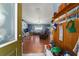 Open-concept living room boasts hardwood floors, and an abundance of natural light at 6150 Nw 59Th Ave, Ocala, FL 34482