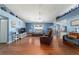 Spacious living room with wood floors and ceiling fan at 6150 Nw 59Th Ave, Ocala, FL 34482