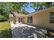 An outdoor patio offers space for entertaining, and enjoying the sunshine at 6150 Nw 59Th Ave, Ocala, FL 34482