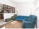 Inviting living room featuring comfortable seating, a decorative screen, and ample natural light at 731 Cloverleaf Blvd, Deltona, FL 32725