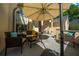 Cozy outdoor patio area with comfortable seating, perfect for relaxing and entertaining at 7692 Sw 117Th Street Rd, Ocala, FL 34476