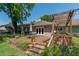 Beautiful backyard with a wooden deck, pergola, and comfortable outdoor seating at 8120 Nw 48Th Ln, Ocala, FL 34482