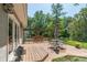 Relaxing backyard with a spacious deck featuring a pergola and outdoor seating at 8120 Nw 48Th Ln, Ocala, FL 34482
