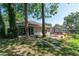 An outdoor oasis with a deck, patio, mature trees, and private backyard at 8120 Nw 48Th Ln, Ocala, FL 34482