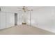 Spacious bedroom with a sliding door closet and doorway to another room at 8371 Sw 109Th St, Ocala, FL 34481