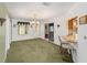 Charming dining area featuring stylish lighting and convenient breakfast bar access at 8371 Sw 109Th St, Ocala, FL 34481
