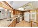 Well-equipped kitchen featuring stainless steel appliances, granite counters, and ample cabinetry at 8371 Sw 109Th St, Ocala, FL 34481