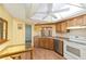 Bright kitchen featuring modern appliances, ample counter space, and a skylight at 8371 Sw 109Th St, Ocala, FL 34481