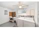 Functional laundry area featuring modern appliances, a utility sink, and extra work space at 8371 Sw 109Th St, Ocala, FL 34481