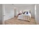 Bedroom with a comfortable bed, soft lighting, and ample closet space offers a peaceful retreat at 9101 Sw 91St Cir, Ocala, FL 34481