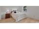 Well-lit bedroom features a comfortable bed, wooden furniture, and a serene atmosphere for restful nights at 9101 Sw 91St Cir, Ocala, FL 34481