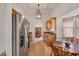 Bright kitchen with stainless steel appliances, granite countertops, breakfast nook and light wood flooring at 9101 Sw 91St Cir, Ocala, FL 34481