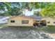 Spacious backyard with partially covered patio, perfect for outdoor relaxation and entertainment at 9153 Sw 83Rd Ter # E, Ocala, FL 34481