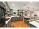 A well-appointed kitchen with sleek appliances, modern cabinets, and a functional island at 9153 Sw 83Rd Ter # E, Ocala, FL 34481