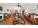 Spacious living room with hardwood floors, vaulted ceiling, and abundant natural light at 9153 Sw 83Rd Ter # E, Ocala, FL 34481
