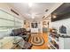 Spacious living room with hardwood floors and bright, natural light at 9153 Sw 83Rd Ter # E, Ocala, FL 34481