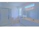 Bright bathroom features double sinks, a tub, and a glass-enclosed shower at 9325 Se 132Nd Pl, Summerfield, FL 34491