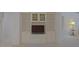Spacious living area with built-in shelving and cabinets at 9325 Se 132Nd Pl, Summerfield, FL 34491