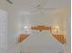 Comfortable main bedroom offering generous space and a ceiling fan at 9325 Se 132Nd Pl, Summerfield, FL 34491