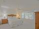 Cozy main bedroom with natural lighting and elegant wooden furniture at 9325 Se 132Nd Pl, Summerfield, FL 34491