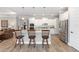 Modern kitchen with white cabinetry, granite countertops, and stainless steel appliances at 9573 Sw 79Th Loop, Ocala, FL 34481