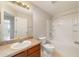 Bright bathroom features a vanity sink, and a shower-tub combination at 9896 Sw 56Th Ct, Ocala, FL 34476