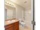 Bright bathroom features a vanity sink, and a shower-tub combination at 9896 Sw 56Th Ct, Ocala, FL 34476