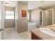 Neutral bathroom featuring a soaking tub and vanity at 9896 Sw 56Th Ct, Ocala, FL 34476