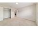 Neutral bedroom with plush carpeting, closet and bathroom entrances at 9896 Sw 56Th Ct, Ocala, FL 34476