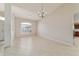 Bright dining room with tile flooring, large window, and decorative chandelier at 9896 Sw 56Th Ct, Ocala, FL 34476
