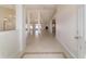 Spacious home foyer features neutral tile flooring that leads into a large and open living area at 9896 Sw 56Th Ct, Ocala, FL 34476