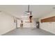 Clean, spacious garage with convenient attic access ladder and ample storage at 9896 Sw 56Th Ct, Ocala, FL 34476