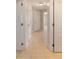 Bright hallway with ceramic tile flooring at 9896 Sw 56Th Ct, Ocala, FL 34476