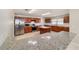 Modern kitchen boasting granite countertops, stainless steel appliances, and ample cabinet space at 9896 Sw 56Th Ct, Ocala, FL 34476