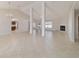 Spacious living room featuring an open floor plan, fireplace, and neutral color palette at 9896 Sw 56Th Ct, Ocala, FL 34476
