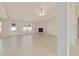 Inviting living area with natural light, fireplace, and access to the backyard at 9896 Sw 56Th Ct, Ocala, FL 34476