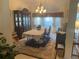 Formal dining room with elegant chandelier at 9915 Sw 47Th Ave, Ocala, FL 34476