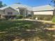 Charming single-story home features a well-manicured lawn and walkway leading to the front door at 9915 Sw 47Th Ave, Ocala, FL 34476