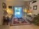 Cozy living room with sliding glass doors at 9915 Sw 47Th Ave, Ocala, FL 34476
