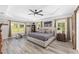 Spacious bedroom with ample natural light, modern decor, and a serene atmosphere at 9950 Nw 11Th Ter, Ocala, FL 34475