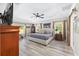 Spacious bedroom with ample natural light, modern decor, and a serene atmosphere at 9950 Nw 11Th Ter, Ocala, FL 34475